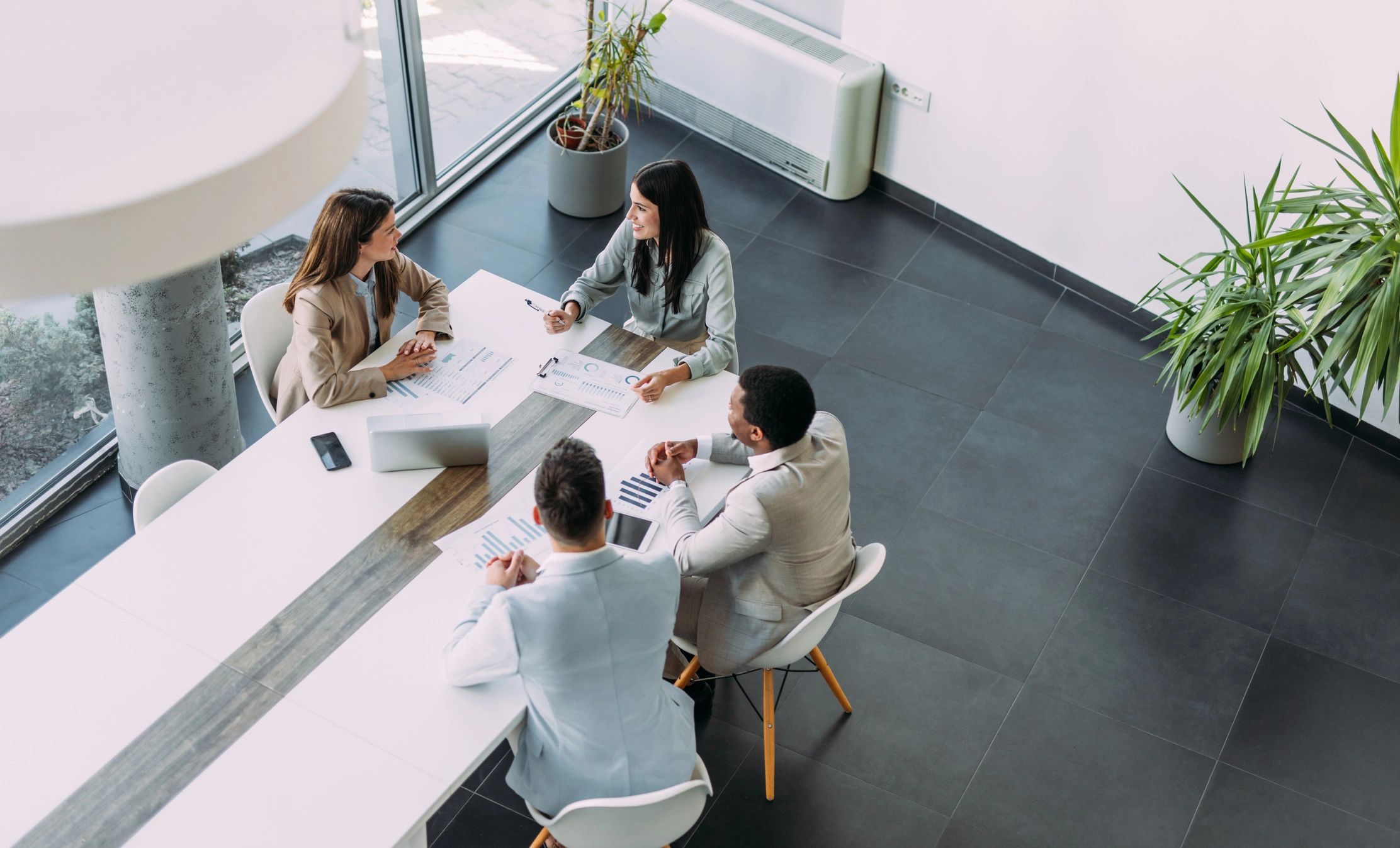 Consultant facilitating a strategy discussion with a business team